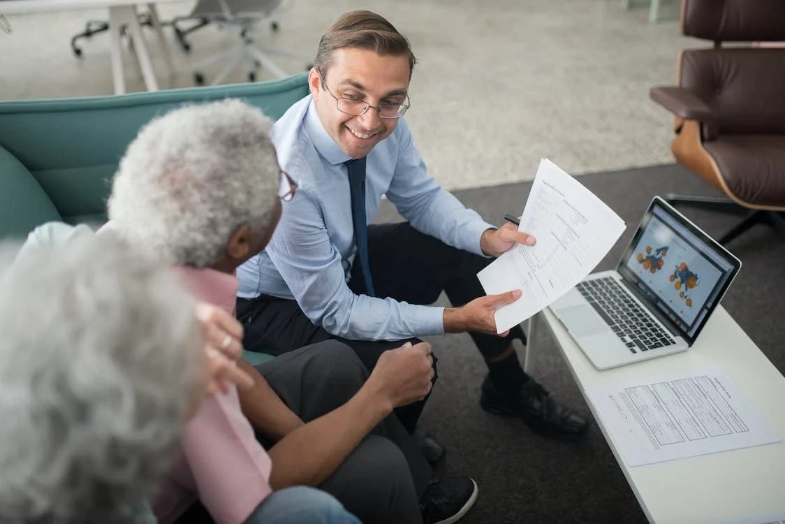 Man showing accounting data to owners